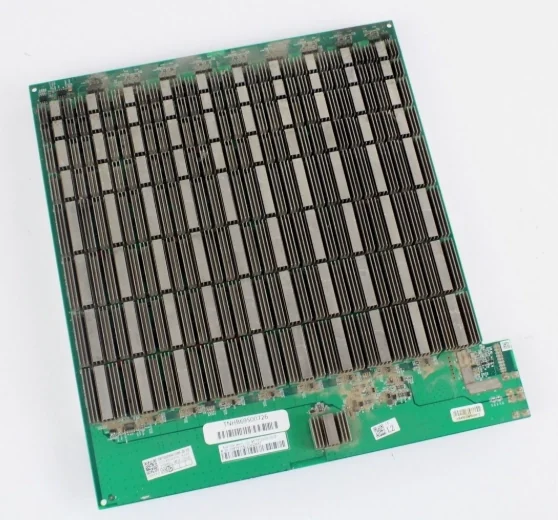 A single used Bitmain Antminer S19 Pro hashboard laid flat on white, its whole face covered by parallel rows of grey aluminium heatsink strips with the green circuit board and its barcode labels showing along the bottom edge.