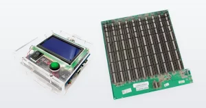 A universal Antminer hashboard test fixture and an Antminer S19 Pro hashboard.