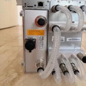 The rear panel of the Antminer S19 XP Hyd: quick-release coolant fittings, clear hoses and the control board's ports and SD slot.