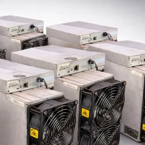 Antminer S19k Pro units in two rows, dual cooling fans and control boards facing out.